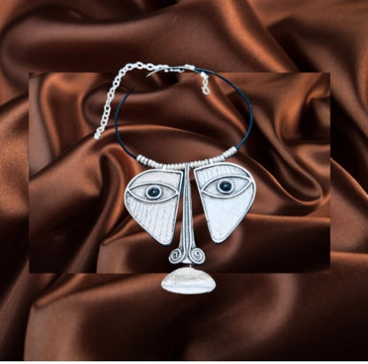 Very unusual face necklace